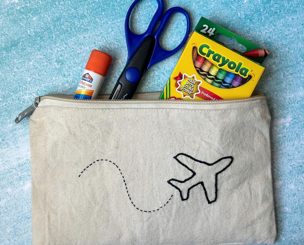 Hand Embroidered Airplane Canvas Pouch.